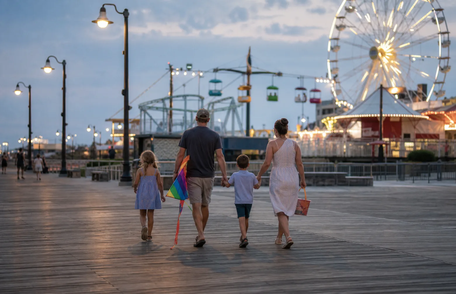 A family walking together near the Ocean City Boardwalk and beach